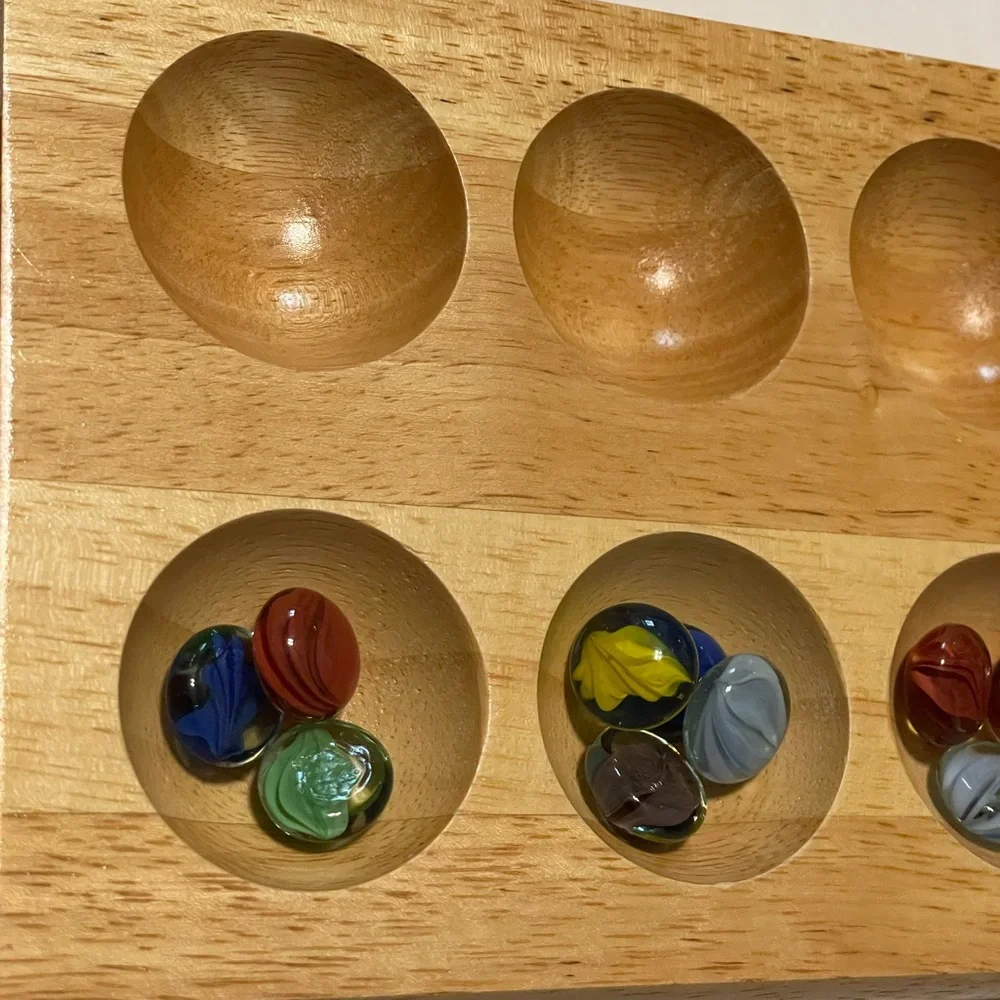 Folding Wooden Mancala Game with Colorful Stones In Metal Box